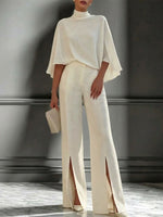 Elegant Solid-color Set Featuring A Mock-neck Cape-style Top And Split-leg Wide-leg Trousers