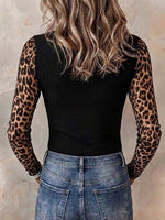 Women's Black Ribbed Top With Sheer Leopard Mesh Sleeves And Cutouts